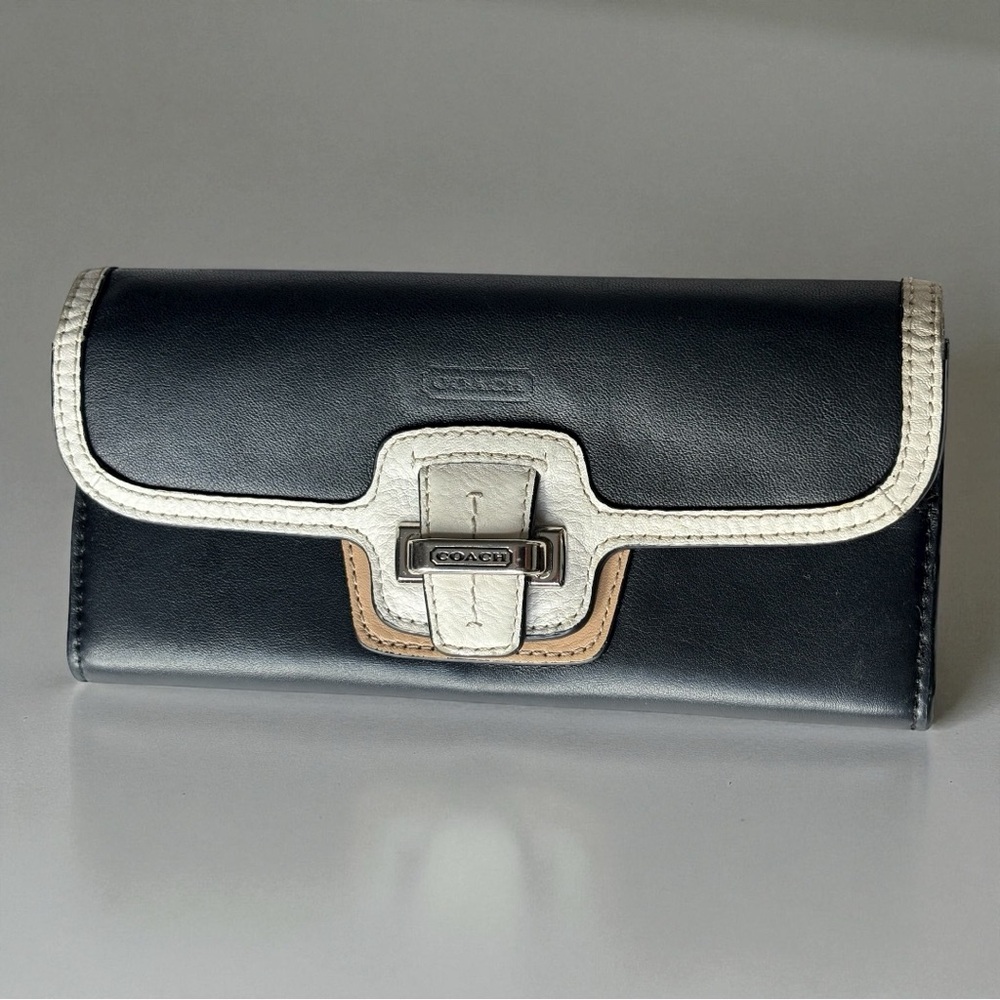 Coach Taylor Spectator black with white trim snap buckle closure leather wallet